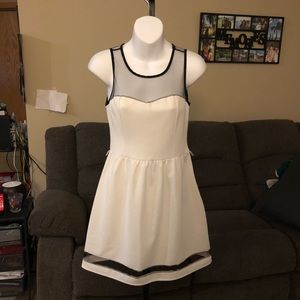White dress with black sheer.